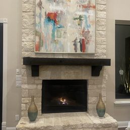 Artwork on stone fireplace.. drill holes so small that you can't see them!