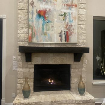 HANG PROS - Artwork on stone fireplace.. drill holes so small that you can't see them! - TV Mounting Near Me