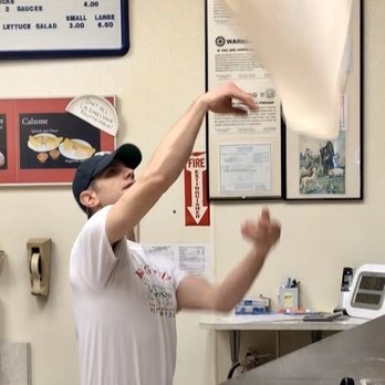 Flying Pizza - Living up to their name a pie takes flight. - Pizza Near Me - Dayton, Ohio
