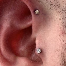 The Shaman's Den - Tragus and forward helix piercings