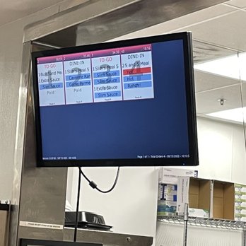 Slim Chickens - Our order of a chicken sandwich, after 36 minutes of waiting. The whole screen in red. - Chicken Wings Near Me - Kingwood, Texas