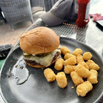 Wilderness Club Resort - Cheeseburger with a side of tater tots, my husband loved his meal. - Resorts Near Me - Eureka, Montana Wilderness Club Resort - Cheeseburger with a side of tater tots, my husband loved his meal. - Resorts Near Me - Eureka, Montana