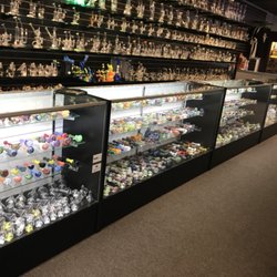 Filters Cigar and Smoke Shop - American Glass and Local Artist on the shelves every day!