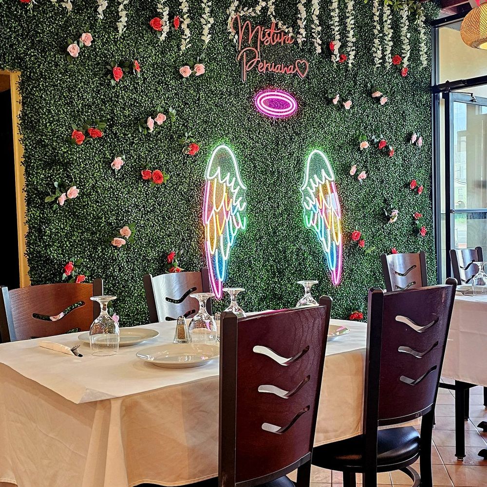 Mistura Peruana - Selfie wall. Love the table cloth settings. - Peruvian Near Me - Ozone Park, New York
