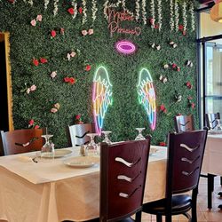Mistura Peruana - Selfie wall. Love the table cloth settings.