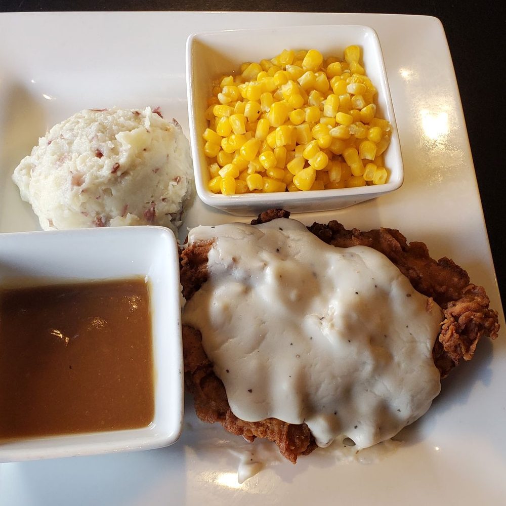 Brother's - Fried chicken with white gravy, mashed red potatoes with brown gravy on the side and corn niblets. - American Near Me - Young Harris, Georgia Brother's - Fried chicken with white gravy, mashed red potatoes with brown gravy on the side and corn niblets. - American Near Me - Young Harris, Georgia