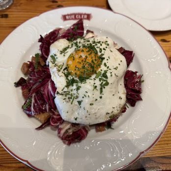 Rue Cler - My dining companions thought this radicchio salad was ridiculous. I thought it was awesome! Tons of radicchio and lardons and egg. - French Near Me - Durham, North Carolina Rue Cler - My dining companions thought this radicchio salad was ridiculous. I thought it was awesome! Tons of radicchio and lardons and egg. - French Near Me - Durham, North Carolina