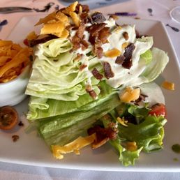 Wedge salad (I took blue crumbles off and got ranch) Wedge salad (I took blue crumbles off and got ranch)