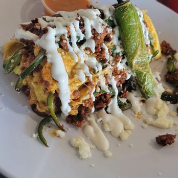 Huevos Avenue - Chorizo Omelette, Hash brown, and one spicy Sereno pepper. - Mexican Near Me - Henderson, Nevada Huevos Avenue - Chorizo Omelette, Hash brown, and one spicy Sereno pepper. - Mexican Near Me - Henderson, Nevada
