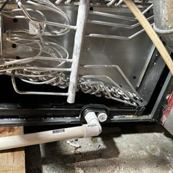 Topline Heating & Air - Shows connection to the wrong drain on pan