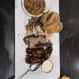 4 meat meal with pulled pork, pulled chicken, beef brisket and chicken wings with fries and baked beans 4 meat meal with pulled pork, pulled chicken, beef brisket and chicken wings with fries and baked beans
