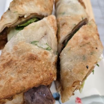 MY Dumpling - Beef wrap with lettuce. A bit oily in the pancake. - Chinese Near Me - San Mateo, California MY Dumpling - Beef wrap with lettuce. A bit oily in the pancake. - Chinese Near Me - San Mateo, California