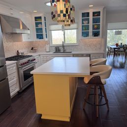 Kitchen area merging with living room area.