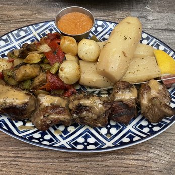 Village Taverna - Lamb Kebab and lemon potatoes - Greek Near Me - New York, New York Village Taverna - Lamb Kebab and lemon potatoes - Greek Near Me - New York, New York