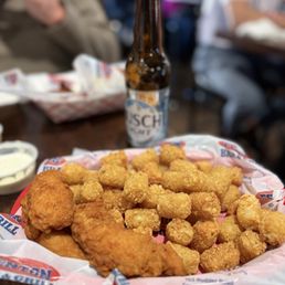 Trashed chicken tenders (4) with tots.