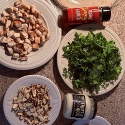 Toasted Sesame Oil, Spicy Honey Sauce, Wild Arugula, Cooked chicken uncured Pancetta, Brown Beech mushrooms, smashed Burrata, Truffle Aioli