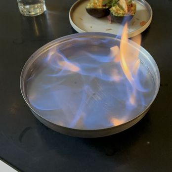 Farzi Cafe - Fire show of fire chicken sourdough kulcha - IG @bougiefoodieboi - Indian Near Me - Bellevue, Washington