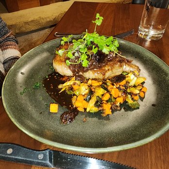 The Whistling Grizzly - Bone-in Pork Loin with Sweet Potato Brussel Hash - American Near Me - Jackson, Wyoming