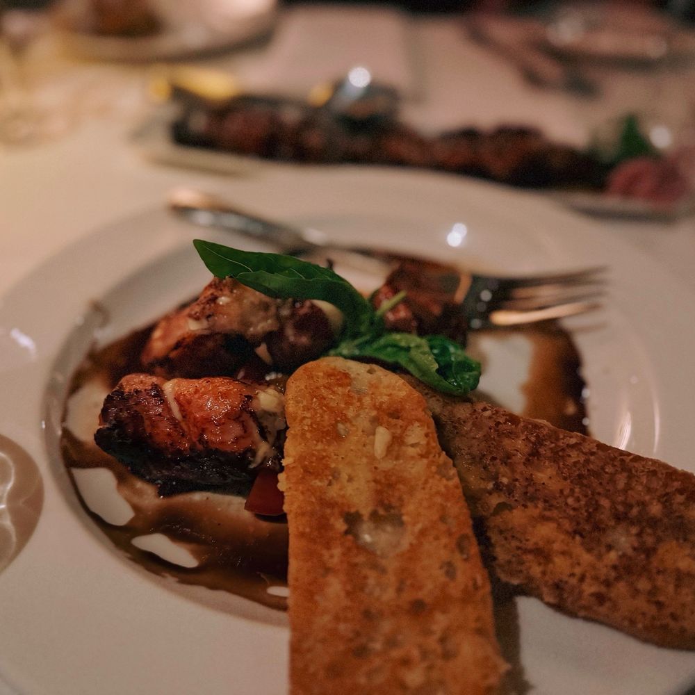 The Capital Grille - Prosciutto-Wrapped Mozzarella with Vine Ripe Tomatoes - Steakhouses Near Me - Burbank, California The Capital Grille - Prosciutto-Wrapped Mozzarella with Vine Ripe Tomatoes - Steakhouses Near Me - Burbank, California