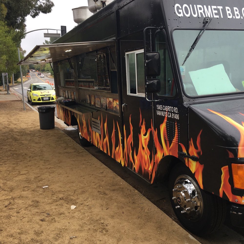 Flaming Lava Grill - a black food truck with flames on it - Food Trucks Near Me - Los Angeles, California Flaming Lava Grill - a black food truck with flames on it - Food Trucks Near Me - Los Angeles, California