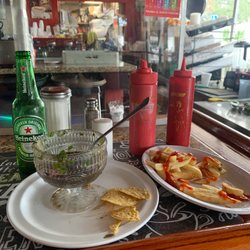 El Tipico Guanaco - Good Food Concha's Negras Coctel  French Fries and A really Cold Heineken
