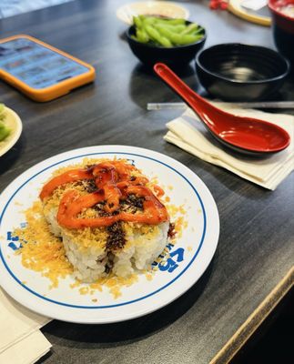 Kura Revolving Sushi Bar by null
