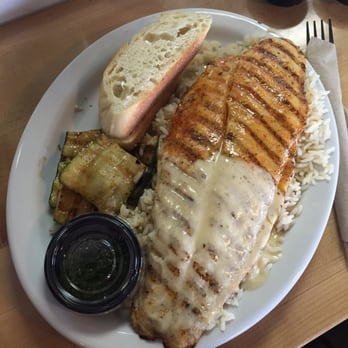 California Fish Grill - only $7.99 for this huge swai plate!  half garlic butter and half cajun with chimichurri on the side. the whole shebang! - Seafood Near Me - Brea, California