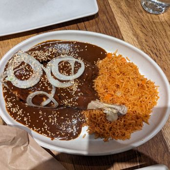 Nopalito - Mole Poblanoon Poved - Braised half chicken, dry chiles, spices, plantains, ts, hoolate, sesame seeds, onions - Mexican Near Me - San Francisco, California Nopalito - Mole Poblanoon Poved - Braised half chicken, dry chiles, spices, plantains, ts, hoolate, sesame seeds, onions - Mexican Near Me - San Francisco, California