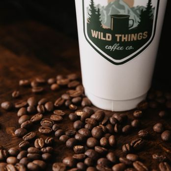 Wild Things Coffee - a coffee cup surrounded by coffee beans - Coffee & Tea Near Me - Meridian, Idaho Wild Things Coffee - a coffee cup surrounded by coffee beans - Coffee & Tea Near Me - Meridian, Idaho