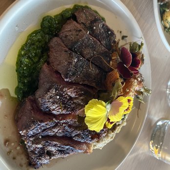 Owamni - Bison ribeye with sunchoke purée, mustard green purée, and roasted carrot - New American Near Me - Minneapolis, Minnesota