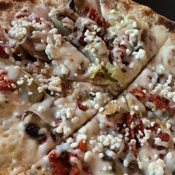 Moon Cricket Grille - Artichoke, mushroom, feta, tomato pizza. Thin crust was killer! - New American Near Me - Winter Garden, Florida Moon Cricket Grille - Artichoke, mushroom, feta, tomato pizza. Thin crust was killer! - New American Near Me - Winter Garden, Florida