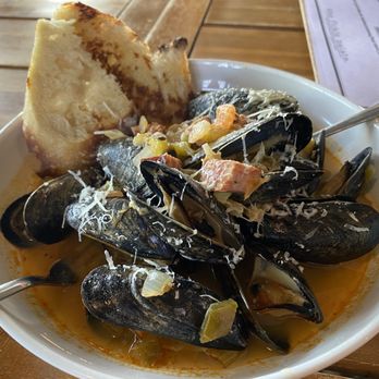 The Fickle Palate - steamed fresh blue mussels, smoked sausage, trinity, green tomato, white wine butter broth w/ grilled house made sourdough bread - Tapas Bars Near Me - Anderson, South Carolina The Fickle Palate - steamed fresh blue mussels, smoked sausage, trinity, green tomato, white wine butter broth w/ grilled house made sourdough bread - Tapas Bars Near Me - Anderson, South Carolina