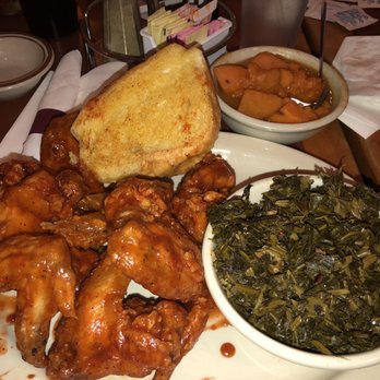 Nikola's Restaurant - Six wings (dipped) with collard greens and yams - Barbeque Near Me - Southfield, Michigan Nikola's Restaurant - Six wings (dipped) with collard greens and yams - Barbeque Near Me - Southfield, Michigan