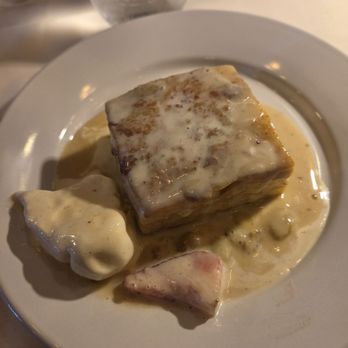 Catherine's Restaurant - Bread pudding arrived with the garnish (ice-cream and a strawberry) fallen off - Caribbean Near Me - Laurel, Maryland