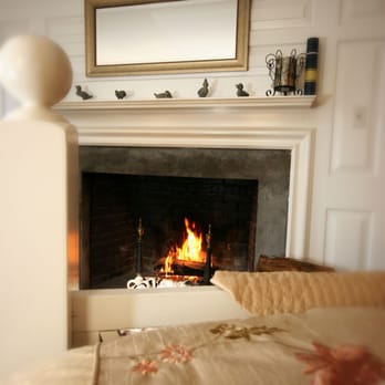 Lamb and Lion Inn - The inn features 12 fireplaces in all! Our favorite is "Barry White" (the poolside outdoor fireplace!) - Hotels Near Me - Barnstable, Massachusetts