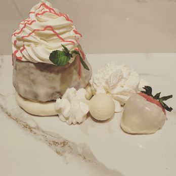 Sweety Cakes - a dessert with whipped cream and strawberries - Desserts Near Me