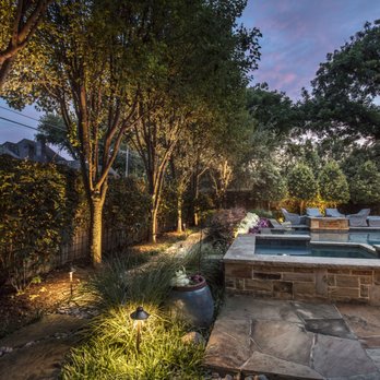 Higher Ground Lawn Care & Lighting - a pool in the evening - Landscaping Near Me - Dallas, Texas Higher Ground Lawn Care & Lighting - a pool in the evening - Landscaping Near Me - Dallas, Texas