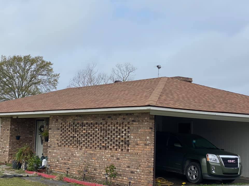 Slide of John Theriots Roofing