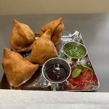 Marigold Indian Cuisine - Samosa are huge. Just get one order that includes 2 piece first. I under estimated the size!! - Indian Near Me - Bloomington, California Marigold Indian Cuisine - Samosa are huge. Just get one order that includes 2 piece first. I under estimated the size!! - Indian Near Me - Bloomington, California