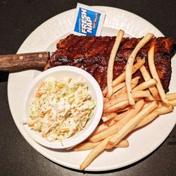 Waterman's Surfside Grille - This is their Baby Back Ribs entrée Local's special. Photo taken November 30, 2023.