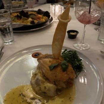 Spain Restaurant - Baked stuffed salmon. - Spanish Near Me - Cranston, Rhode Island Spain Restaurant - Baked stuffed salmon. - Spanish Near Me - Cranston, Rhode Island
