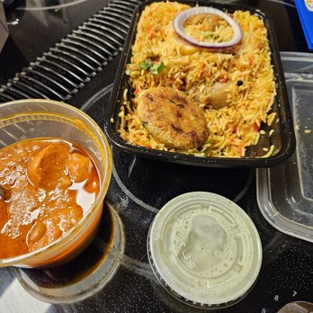 Kzam Foods - Briyani, butter chicken, and cheese pizza - Food Trucks Near Me - Sultan, Washington