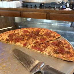 We dug into the pizza so quick I didn't get a photo of the whole pie. However, this is our leftovers to enjoy another day.