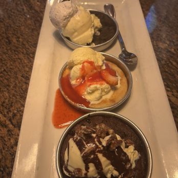 BJ's Restaurant & Brewhouse - Pizookie Trio: cookies n cream, strawberry shortcake, hot fudge brownie - New American Near Me - Houston, Texas