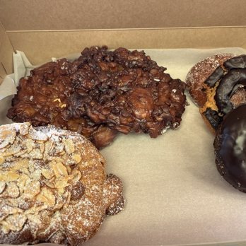 The Donuttery - Almond Bear Claw Croissant, Apple Fritter Donut, Malasadas Guava, Devil's Food Chocolate, chocolate Old Fashioned - chocolate - Donuts Near Me - Huntington Beach, California The Donuttery - Almond Bear Claw Croissant, Apple Fritter Donut, Malasadas Guava, Devil's Food Chocolate, chocolate Old Fashioned - chocolate - Donuts Near Me - Huntington Beach, California