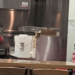 a man and a woman in a kitchen a man and a woman in a kitchen