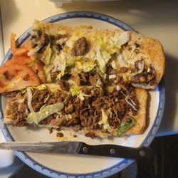 Mancino's Pizza & Grinders - Supposedly "shaved" ribeye . Meat in chunks or ground,not like original. Toppings totally wrong