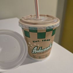 Anderson's Frozen Custard - Child's size chocolate shake with coffee cup lid for scale