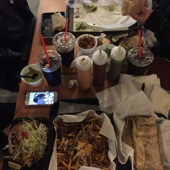 Cali Tacos - Fish taco (yes that is ONE fish taco), carne asada fries, and a chicken supreme burrito. Oh and can't forget their homemade sauces - Mexican Near Me - Orange, California