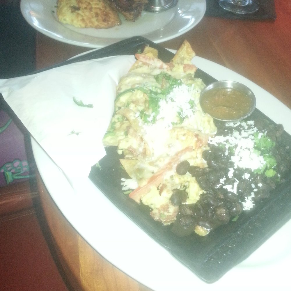 Roaring Fork - Migas & honey drizzled chicken. - New American Near Me - Austin, Texas Roaring Fork - Migas & honey drizzled chicken. - New American Near Me - Austin, Texas